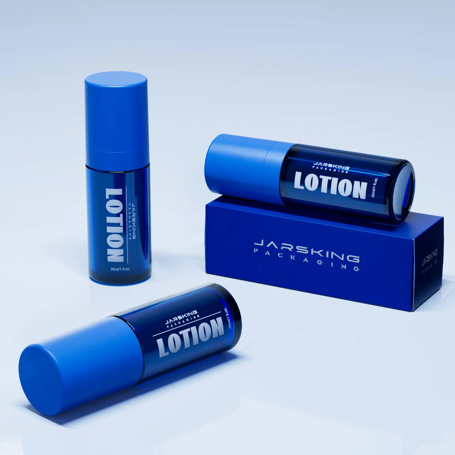 Blue airless lotion bottles and tubes branded Jarsking, custom cosmetic packaging