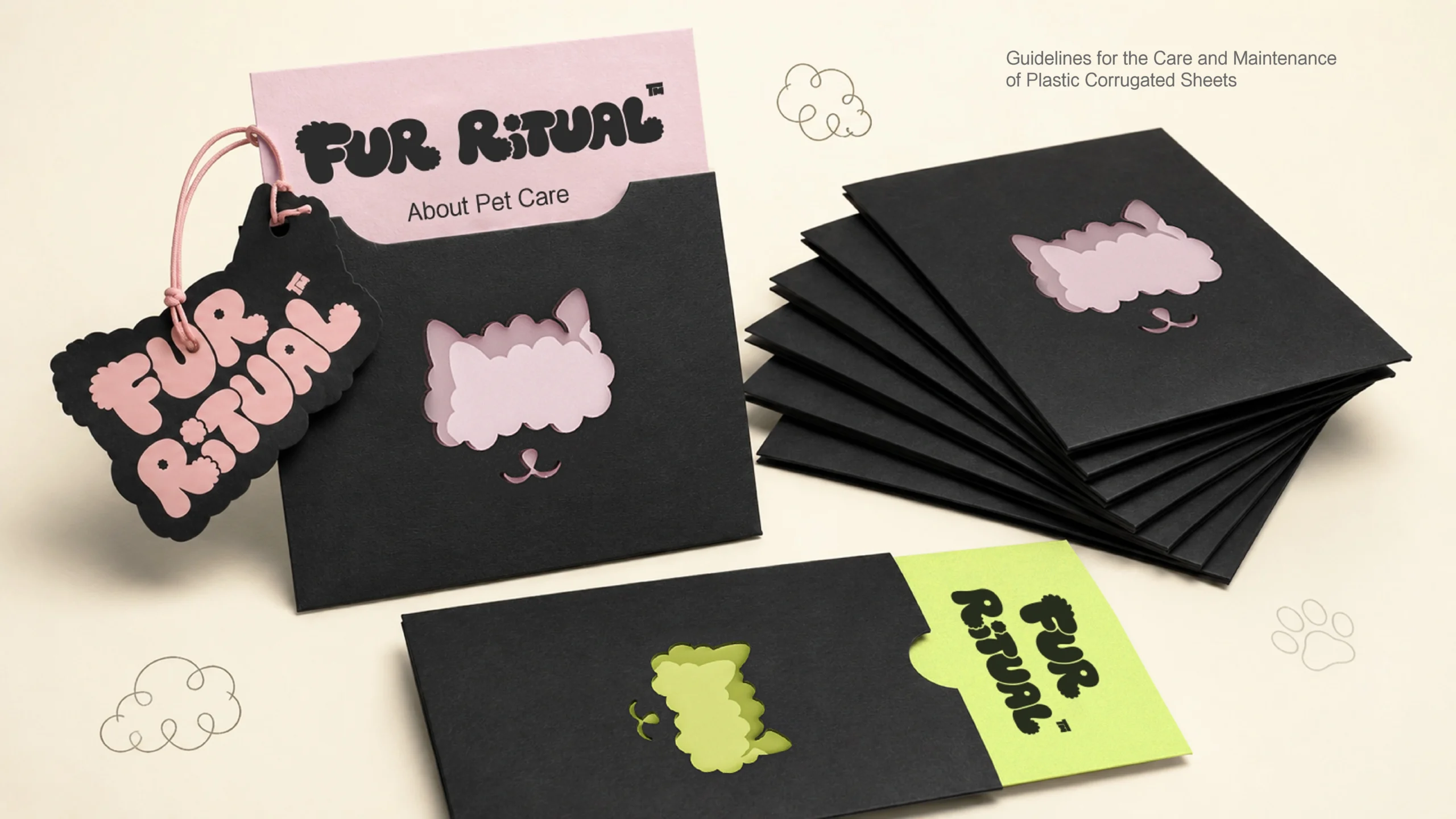 FUR RITUAL printed care cards, die-cut hang tags and black sleeves, on-brand collateral completing the pet grooming packaging system.