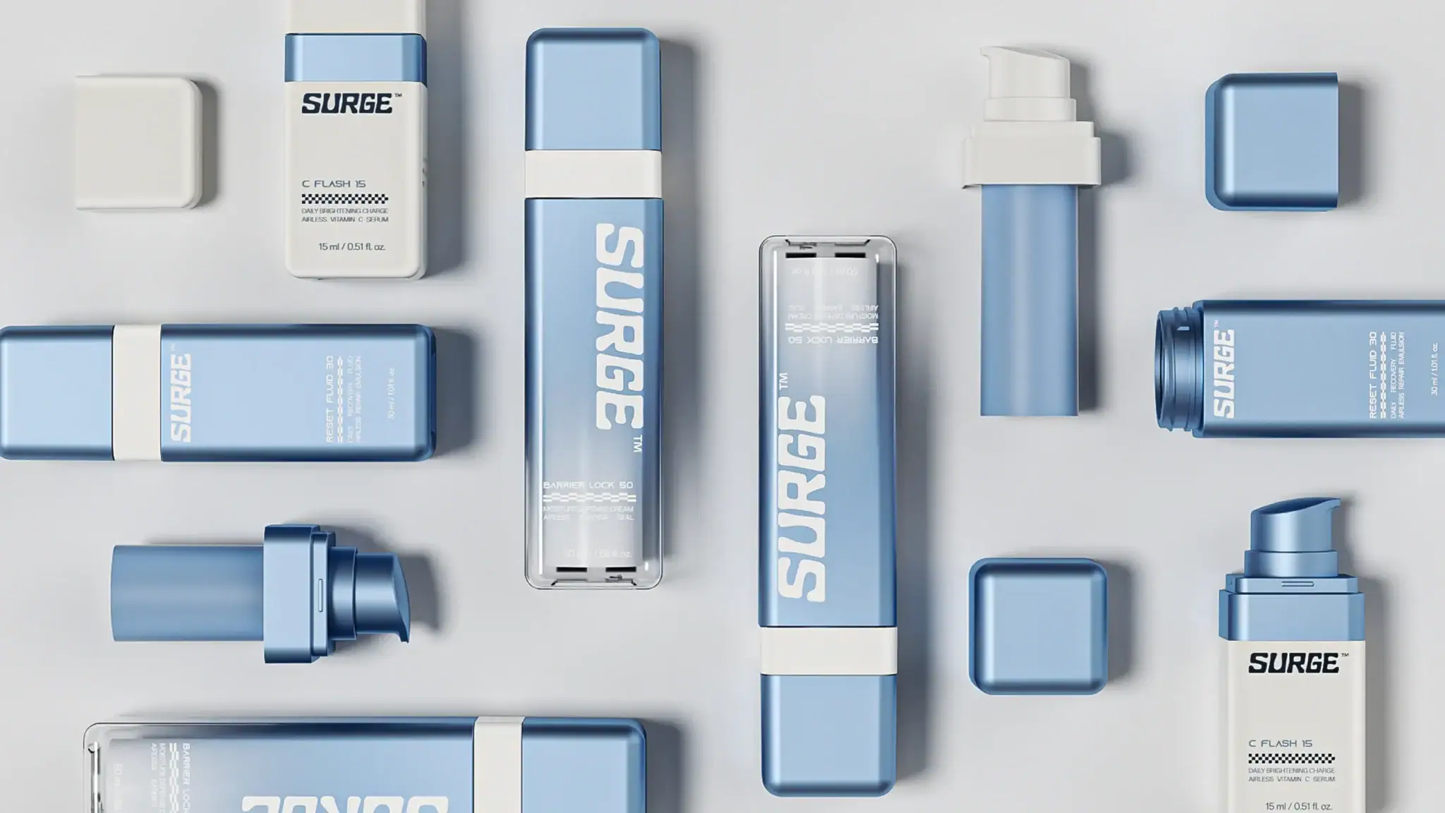 Flat lay of refillable SURGE square airless pump bottle collection