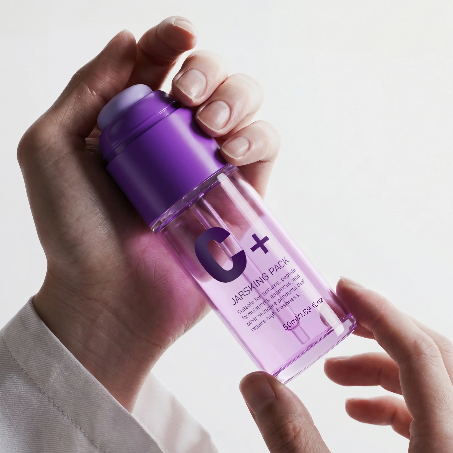 purple-serum-pump-bottle-handheld-display