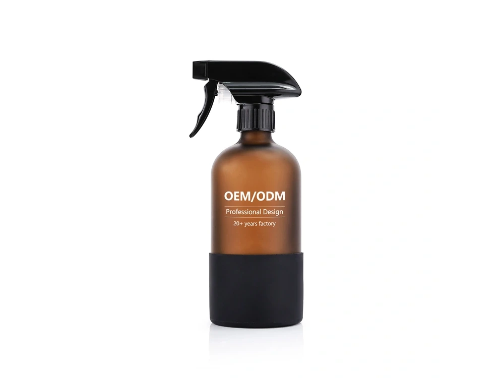 Amber glass trigger spray bottle with a black silicone sleeve