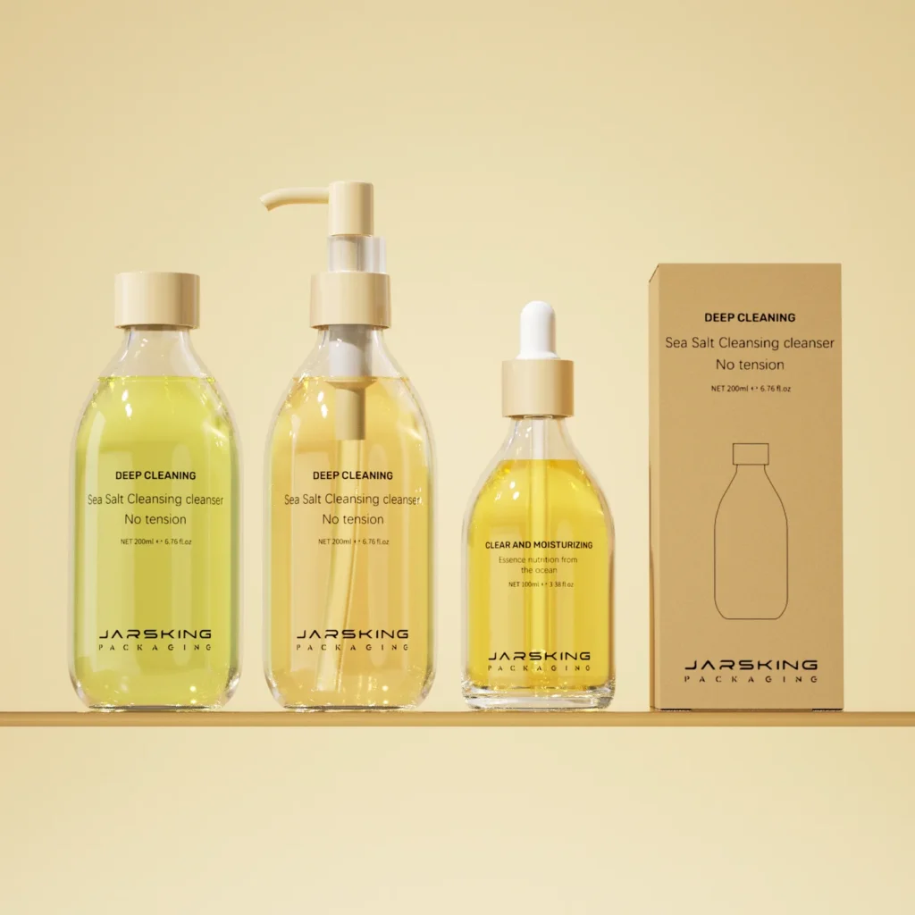 Skincare cleanser set: glass bottles with cap, pump and dropper, and a kraft box